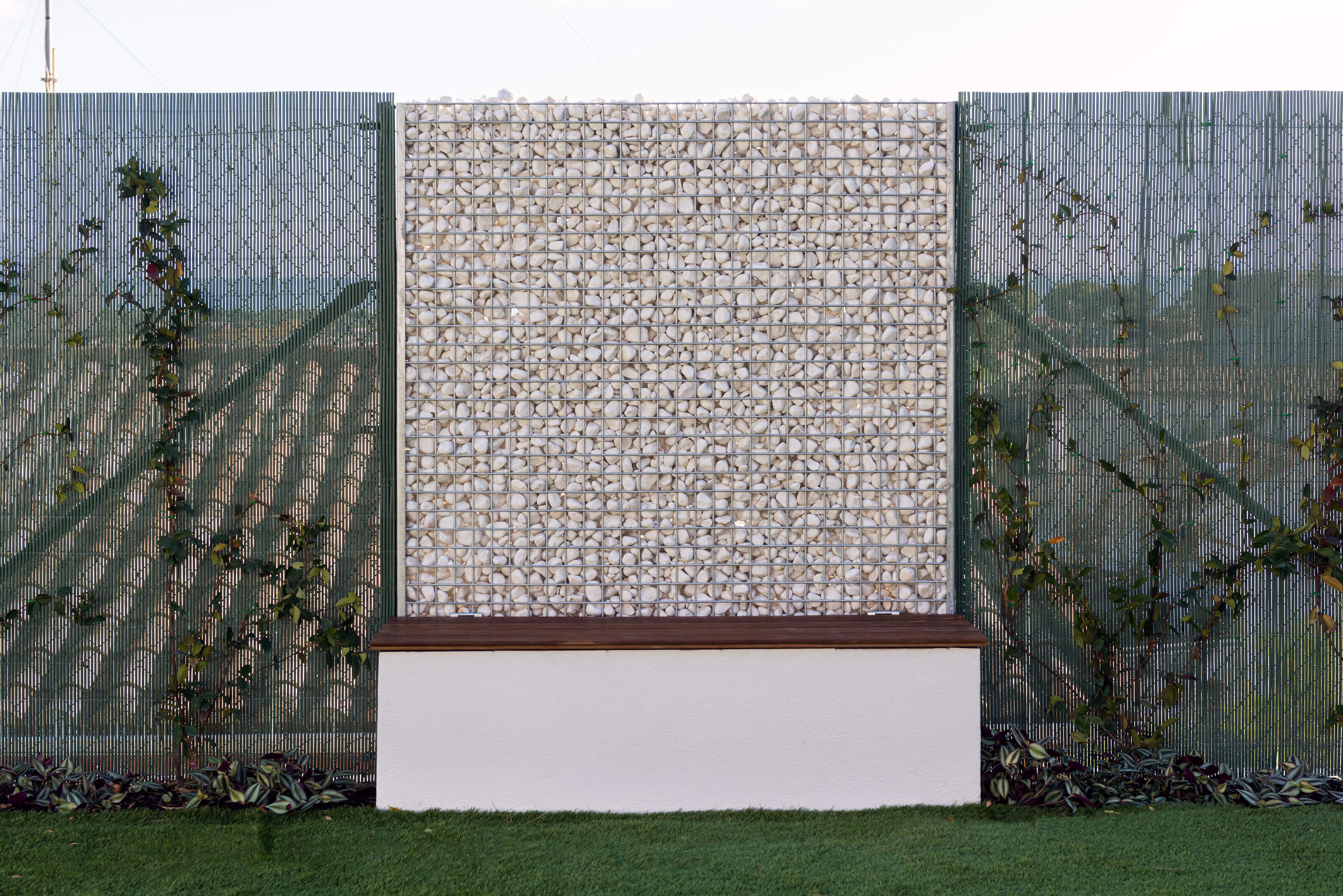 Minimalist garden with privacy screening